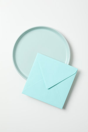 Minimal table setting with blank dish, top viewの写真素材