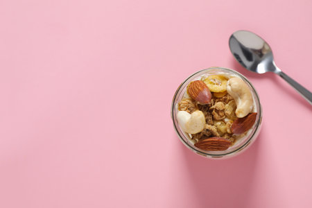 Tasty and nutritious breakfast concept - muesli with yogurtの写真素材