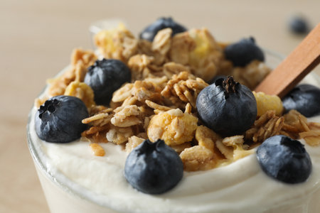 Tasty and nutritious breakfast concept - muesli with yogurt