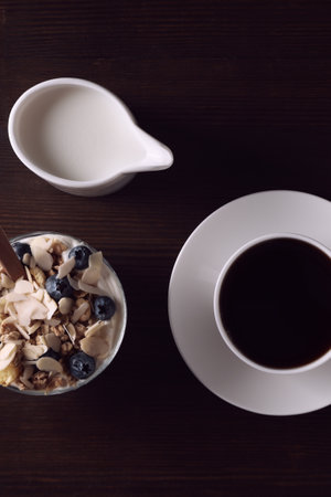 Tasty and nutritious breakfast concept - muesli with yogurtの写真素材