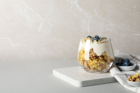 Tasty and nutritious breakfast concept - muesli with yogurtの写真素材