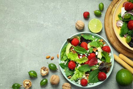 Concept of tasty food, salad with strawberry, space for textの写真素材