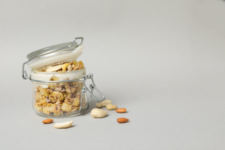 Tasty and nutritious breakfast concept - muesli with yogurtの写真素材