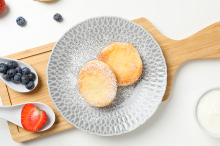 Concept of tasty sweet food, cheese pancakes, top viewの写真素材