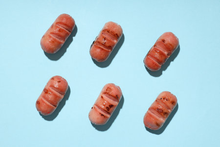 Concept of tasty food, grilled mini sausage, top viewの写真素材