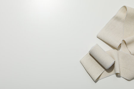 Help during an injury, elastic bandage on white background