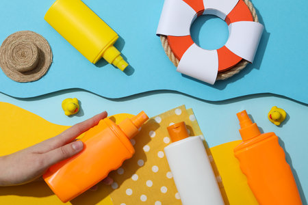 Concept of summer skincare accessories, top view