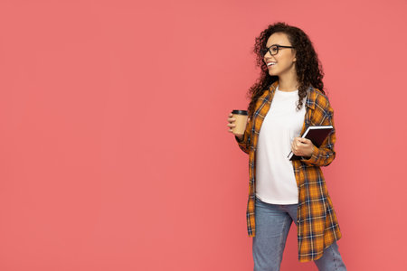 Young woman in casual wearing on pink background