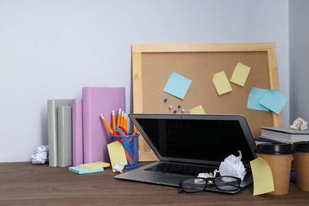Messy office workplace, workplace and workspace conceptの写真素材