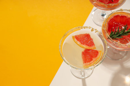 Grapefruit cocktail, alcohol or non alcoholic drink for party, space for textの写真素材