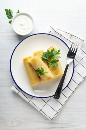 Concept of tasty food, thin pancakes with filling, top viewの写真素材
