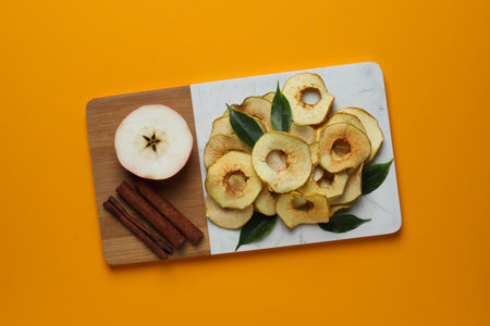 Concept of tasty food, dried apple chips, top view