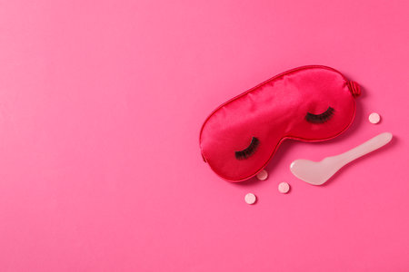 Insomnia and sleep problems composition with sleep mask, space for textの写真素材