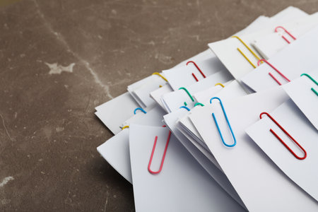 Concept of different office accessories - paper with clipの写真素材