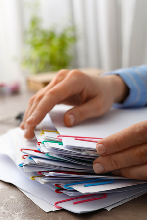 Concept of different office accessories - paper with clip
