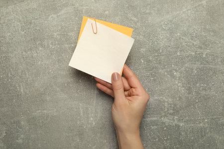 Concept of different office accessories - paper with clipの写真素材