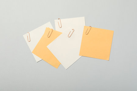 Concept of different office accessories - paper with clip