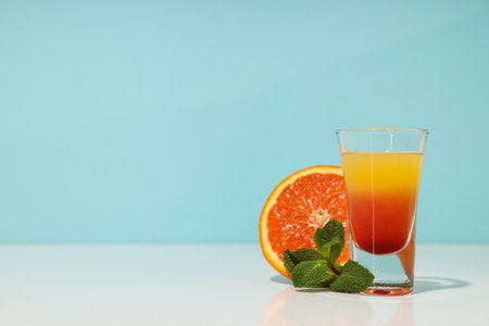 Shot with orange taste, tasty citrus shot conceptの写真素材