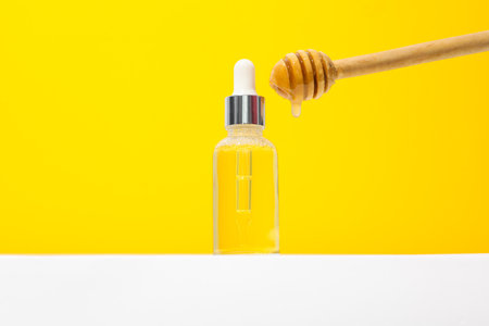 Concept of face and skin care supplies - Honey cosmeticの写真素材