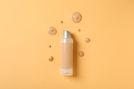 Concept of cosmetic and make up - foundation, top view