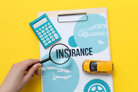 Concept of car purchase and insurance with toy carの写真素材