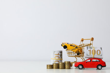 Concept of car purchase and insurance with toy carの写真素材