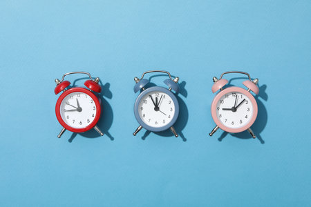Concept of sleep and wake up with alarm clocks