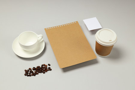 Mockup flat lay with different freelance accessories on light gray backgroundの写真素材