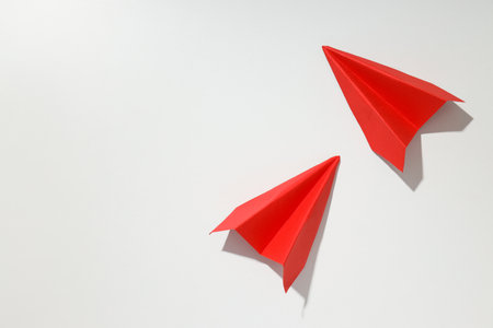 Business, startup and sponsorship concept with paper planes on white backgroundの写真素材