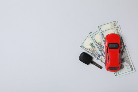 Concept of car purchase and insurance with toy carの写真素材