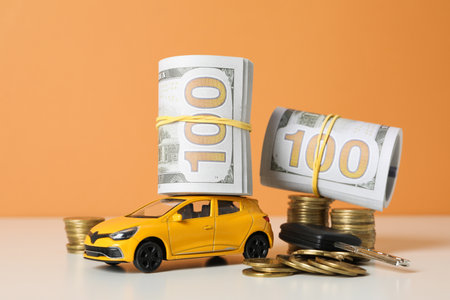 Concept of car purchase and insurance with toy carの写真素材