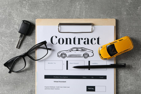 Concept of car purchase and insurance with toy carの写真素材
