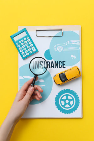 Concept of car purchase and insurance with toy carの写真素材