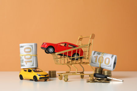 Concept of car purchase and insurance with toy carの写真素材