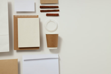 Mockup flat lay with different office accessories on white backgroundの写真素材