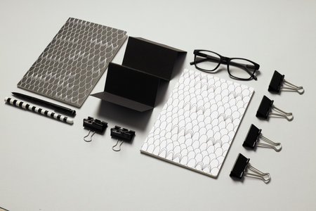 Mockup flat lay with different office accessories on light gray background