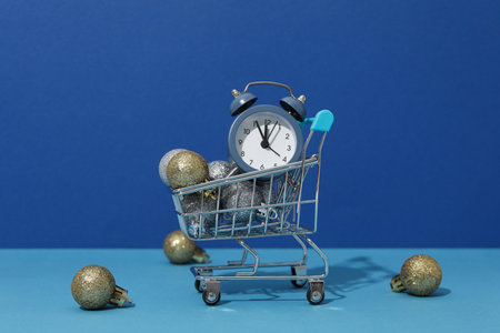 Concept of Christmas shopping time with alarm clockの写真素材