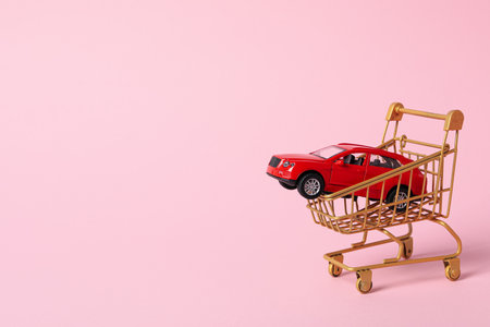 Concept of car purchase and insurance with toy carの写真素材