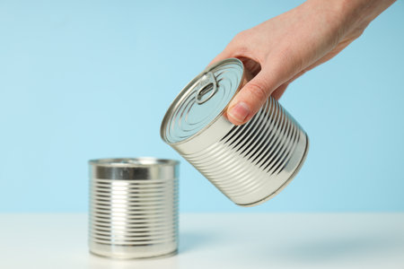 Canned food in blank metal jars, concept of canned foodの写真素材