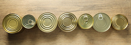 Canned food in blank metal jars, concept of canned food