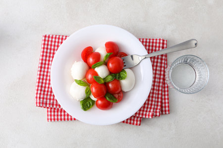 Concept of tasty Italian cuisine food - Caprese saladの写真素材