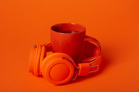 Concept of freelance, composition with hot drink and headphones