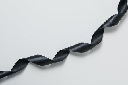 Concept of different ribbons, black ribbon on white backgroundの写真素材