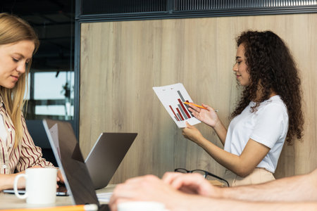 Young people working in office, coworking and office conceptの写真素材