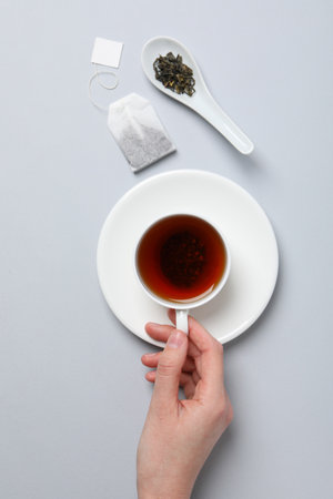 Hot drink to get warm - tea in cupの写真素材