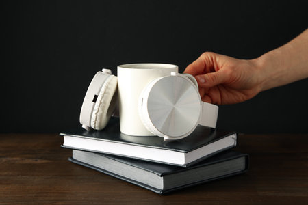Concept of freelance, composition with hot drink and headphones
