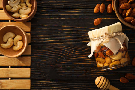 Concept of tasty and sweet food - honey with nutsの写真素材