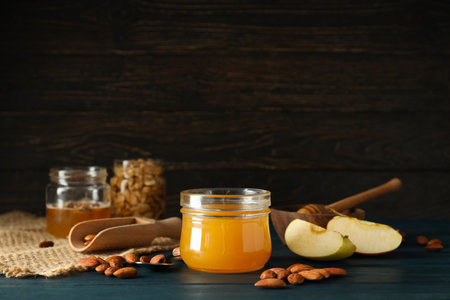 Concept of tasty and sweet food - honey with nutsの写真素材