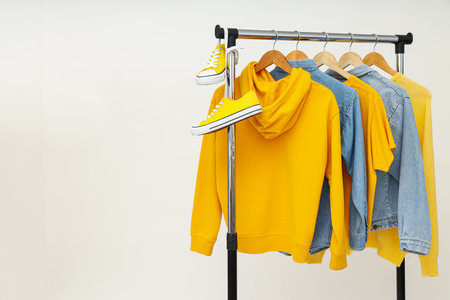 Wardrobe rack with different clothes, concept of different clothesの写真素材