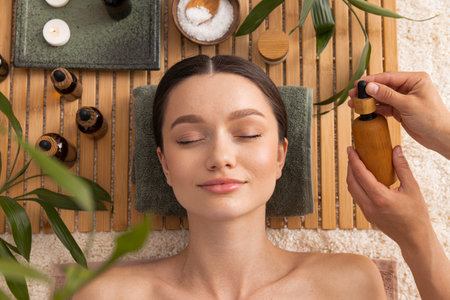 Concept of spa, relax and self care with beautiful young womanの写真素材